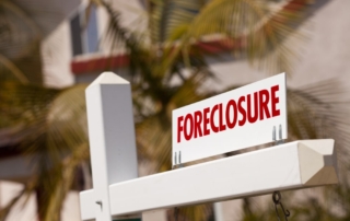 foreclosure lawyer with foreclosure sign